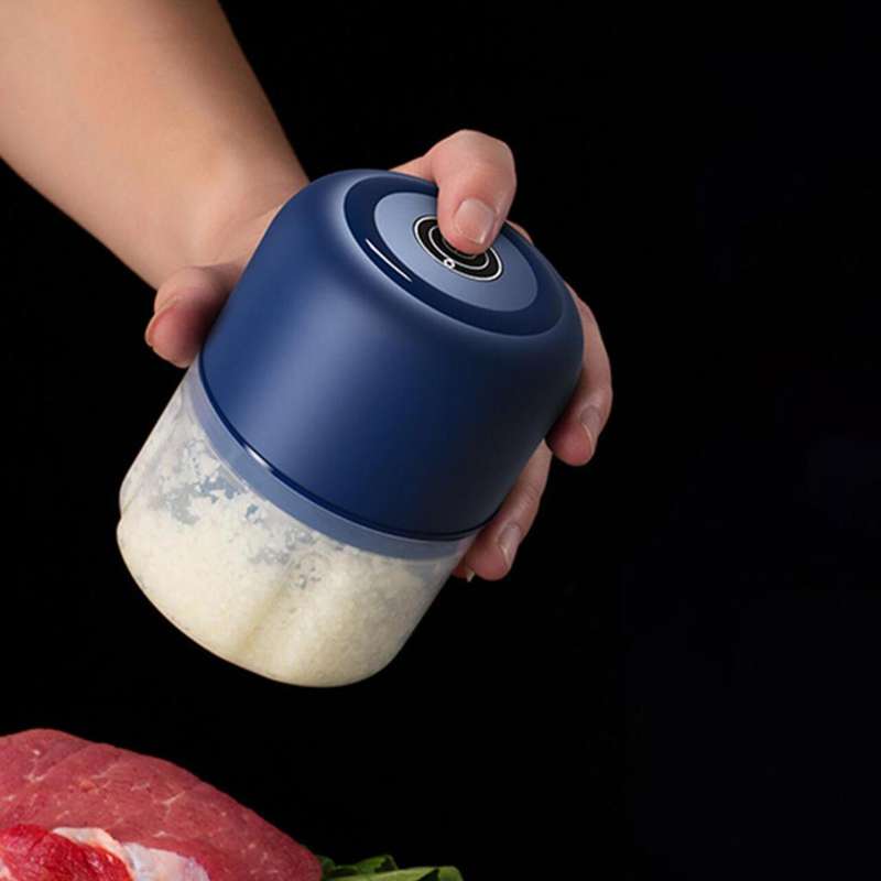 Picador eléctrico compacto con cuchillas de acero inoxidable, ideal para picar frutas, verduras y carnes en segundos