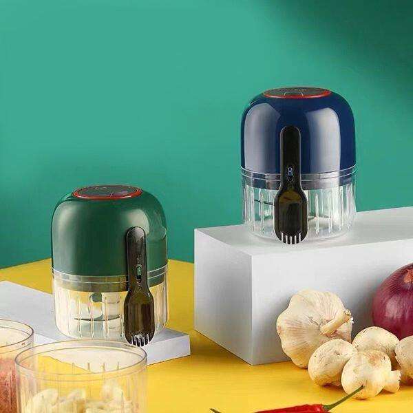 Picador eléctrico compacto con cuchillas de acero inoxidable, ideal para picar frutas, verduras y carnes en segundos
